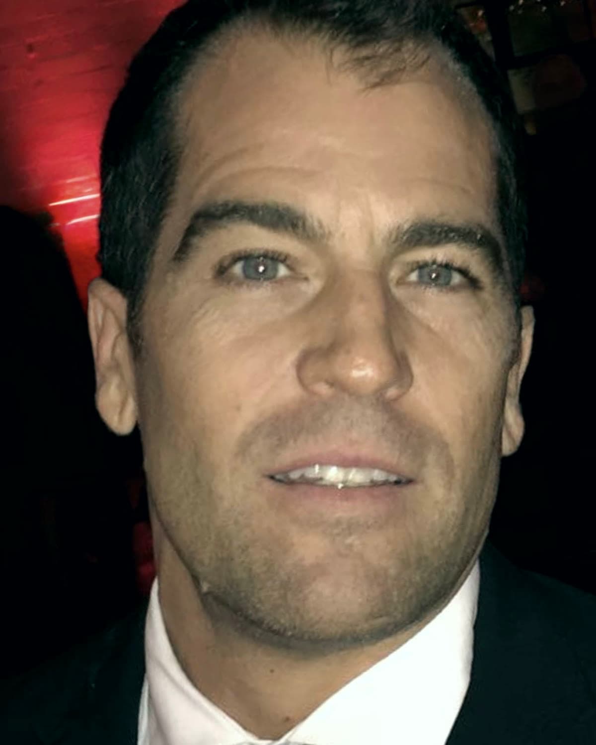 James Turowski in a suit and tie